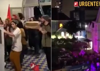 VEJA VÍDEO- Esquerdistas com bandeiras do PT invadem igreja e alegam protesto por afastamento de professora