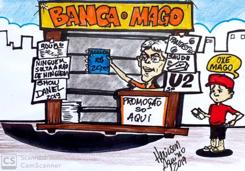 CHARGE DO DIA – Na banca do Mago tem CD com reportagem do Fantástico, agenda de R$ 20,00 e ingresso para show da Banda U2